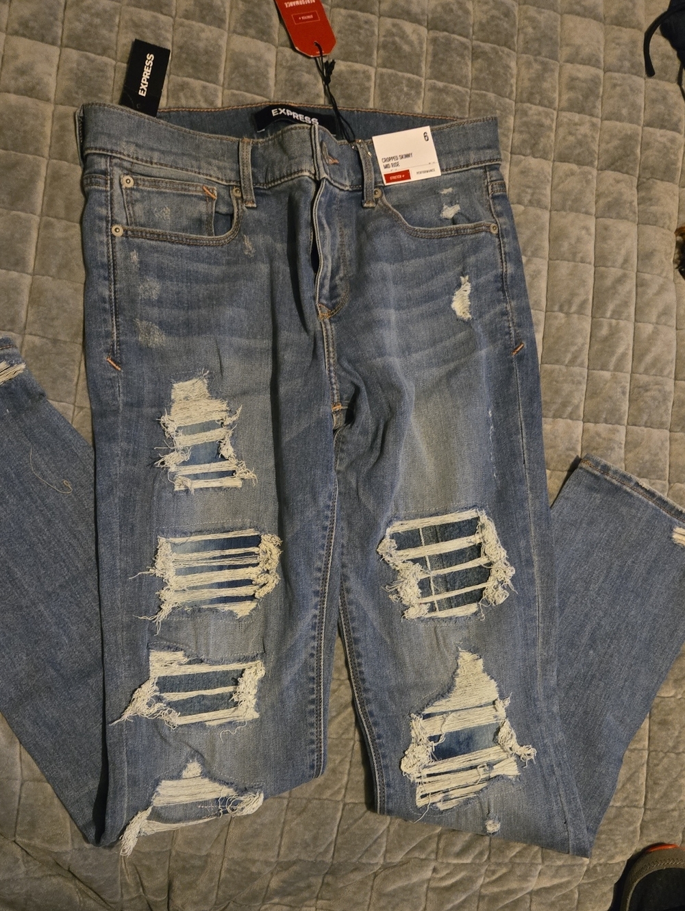 Express Women’s Skinny Ripped Jeans in Light Blue Wash